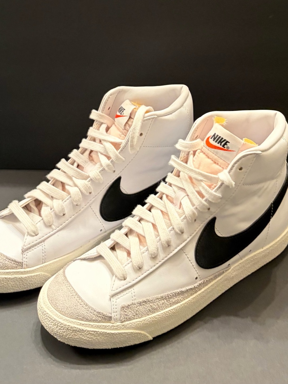 Nike Men’s White High-Top Sneakers with Black Swoosh and Cream Sole